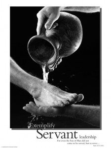 Someone washing someone else's feet