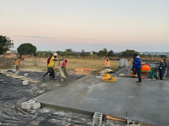 Pouring and troweling the foundation slab