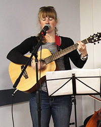 Leanne playing guitar