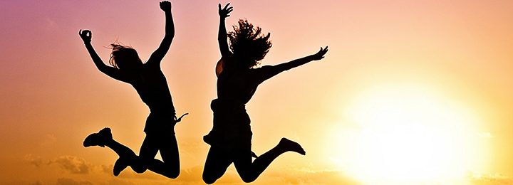 Silhouette people jumping